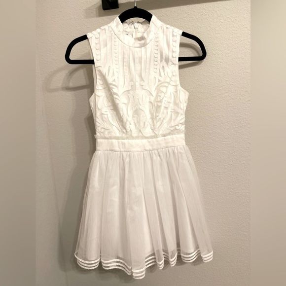 bebe Dresses & Skirts - Bebe white mini dress size 00